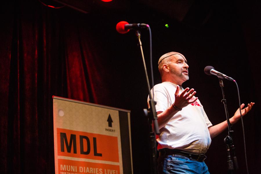 Kurt on stage at the Rickshaw Stop to tell his story at MUNI Diaries Live